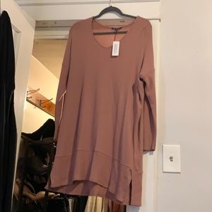 Never worn! Long sleeve sweater dress in mauve.